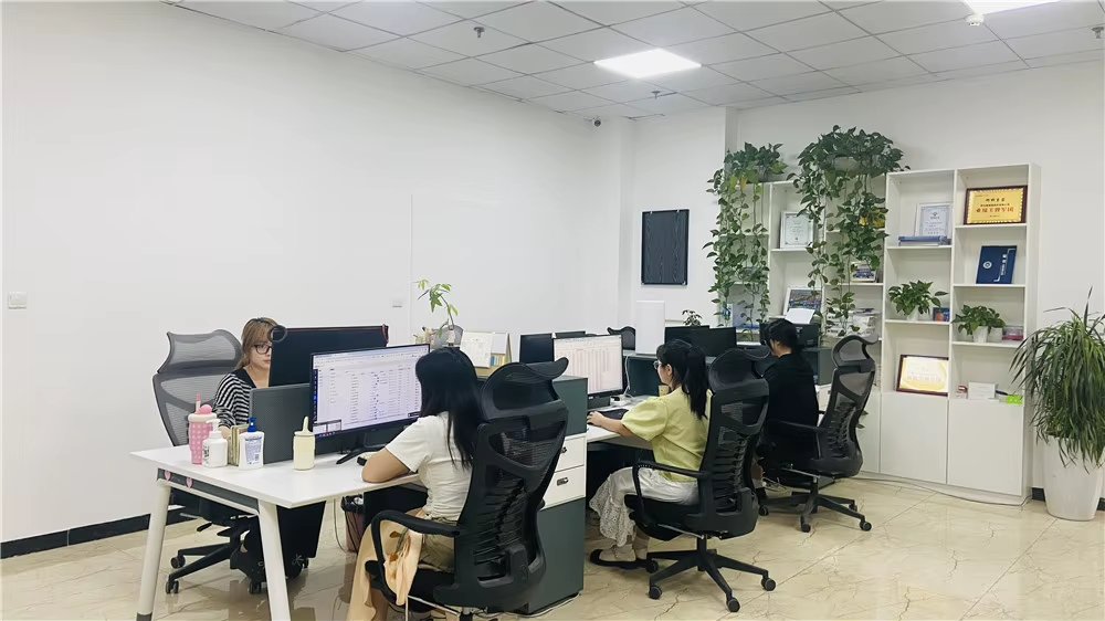 Cletus sales and customer support team working at computer stations